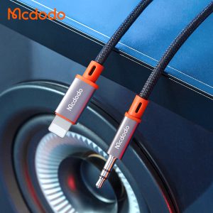 کابل انتقال صدا مک دودو Mcdodo مدل CA-0780 فنری با طول ۱.۲ متر، تبدیل Lightning به جک ۳.۵ میلی‌متر